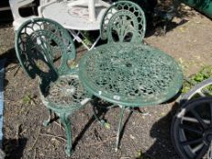 A CAST ALUMINIUM GARDEN TABLE AND TWO SIMILAR CHAIRS, with a 70cm diameter pierced fretwork top,