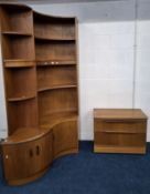 A MID-CENTURY G PLAN FRESCO TEAK CORNER CUPBOARD, with three shelves, atop a base with a single