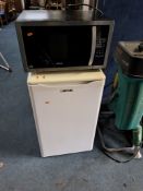 A ZANUSSI UNDER COUNTER FRIDGE width 50cm, depth 60cm, height 84cm along with a Kenwood microwave (