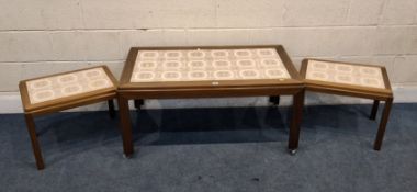 A MID-CENTURY TEAK TILE TOP RECTANGULAR COFFEE TABLE, raised on later castors, width 107cm x depth