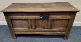 A GEORGIAN OAK COFFER, with a hinged lid and fielded panels, width 135cm x depth 55cm x height 74cm,