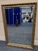 A GILT WOOD RECTANGULAR BEVELLED EDGE WALL MIRROR, 100cm x 71cm, condition report: no visible