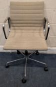 CHARLES EAMES FOR VITRA, A MODEL EA117 SWIVEL OFFICE CHAIR, with beige upholstery, raised on a