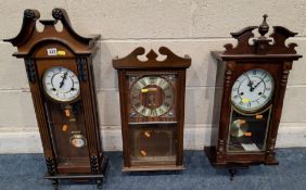 THREE REPRODUCTION WALL CLOCKS, tallest clock height 80cm, condition report: three total winding