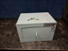 A SECURIKEY MINI VAULT PERSONAL SAFE with three keys, width 37cm, depth 28cm, height 25cm
