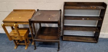 AN EARLY 20TH CENTURY OAK FOUR-TIER OPEN BOOKCASE, raised on castors, width 77cm x depth 23cm x