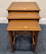 A MID-CENTURY TEAK G PLAN QUADRILLE NEST OF THREE TABLES, largest table 50cm squared x height