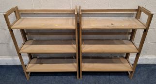 A PAIR OF THREE-TIER FOLDING DEALERS RACKS, width 72cm x depth 30cm x height 74cm, condition report: