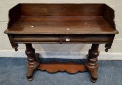 A 19TH CENTURY MAHOGANY WASH STAND, with raised back and sides, two frieze drawers, raised on turned