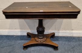 A REGENCY ROSEWOOD TEA TABLE, with a swivel fold-over top, raised on a turned support and a quad-