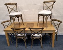 A MODERN LIGHT OAK AND BEECH DINING TABLE, raised on square tapered legs, width 180cm x depth 90cm x