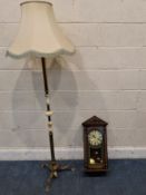 A BRASS AND ONYX STANDARD LAMP, height to fitting, 132cm, along with a wall clock, condition report: