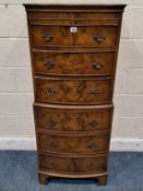 BURTON REPRODUCTIONS LIMITED, A BOW FRONT CHEST OF SIX DRAWERS, raised on bracket feet, width 57cm x