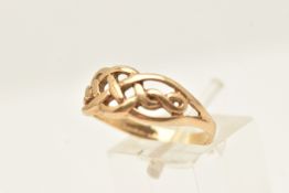 A 9CT YELLOW GOLD BAND RING, Celtic open work pattern, approximate width 8mm, hallmarked 9ct