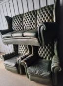 A GREEN LEATHER THREE PIECE LOUNGE SUITE, comprising a curved three seater sofa, width 210cm x depth