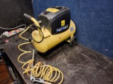 A STANLEY 24 LITRE AIR COMPRESSOR, with 1.5hp motor (PAT pass and working)