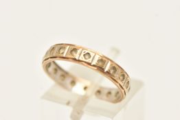 A 9CT GOLD BI-COLOUR FULL SET ETERNITY BAND RING, set with colourless spinel, hallmarked 9ct