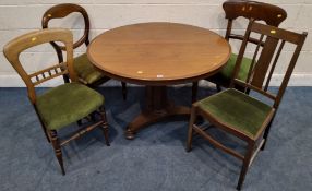A REGENCY MAHOGANY CIRCULAR TABLE, with an octagonal tapered support, on a tri-form base, diameter