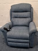 A BLUE UPHOLSTERED ELECTRIC RISE AND RECLINE ARMCHAIR, with adjustable headrest and lumbar