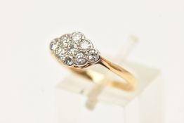 A YELLOW METAL DIAMOND RING, of a lozenge shape set with nine round brilliant cut diamonds, collet