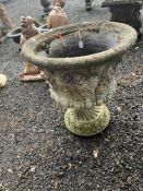 A TWO PIECE CONCRETE GARDEN URN, with foliate detail to bowl, 59cm high, Condition Report: losses to