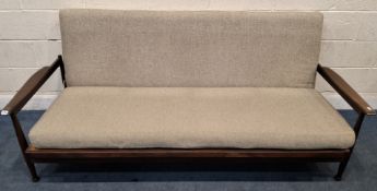 A MID-CENTURY TEAK DAY BED, with open armrests, width 204cm x depth 88cm x height 90cm, condition