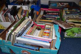 SIX BOXES OF BOTH HARDBACK AND PAPERBACK BOOKS covering subjects such as military history, art,