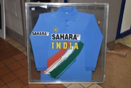 A FRAMED INDIAN ONE DAY INTERNATIONAL (ODI) CRICKET SHIRT, named to Yuvraj Singh, signed and dated