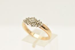 A 9CT GOLD DIAMOND DRESS RING, set with single cut diamonds, claw set, to the plain polished band,