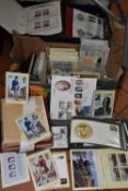 TWO BOXES CONTAINING STAMPS AND POSTCARDS ETC, comprising of stamps in albums and loose First Day