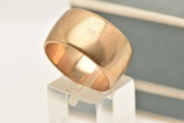 A 9CT YELLOW GOLD WIDE BAND RING, plain polished design, hallmarked 9ct gold London 1973, approx