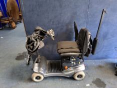 A SHOPRIDER MOBILITY SCOOTER, with one key, charger and cover (PAT pass and working)