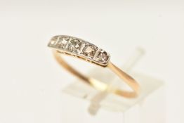 AN EARLY 20TH CENTURY YELLOW AND WHITE METAL RING, set with graduated old cut diamonds, within in