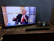 A BUSH 50in LED TV without remote, a Wharfedale hi fi with remote (both PAT pass and working) and