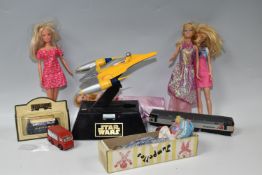 A BOX CONTAINING VINTAGE JUVENALIA to include a Star Wars Naboo Starfighter bedside digital clock (