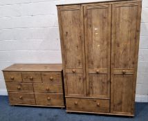 ALSTONS FURNITURE, A PINE EFFECT TRIPLE DOOR WARDROBE, with a single drawer, width 116cm x depth