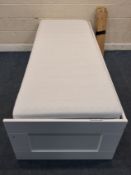 AN IKEA BRIMNES DAY BED, with a pull out section and two drawers, along with a pair of Malfors