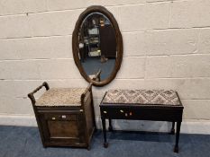 AN EARLY 20TH CENTURY OAK PIANO STOOL, with twin handles, a hinged lid and a fall front door,