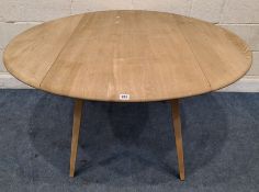 LUCIAN ERCOLANI, AN ERCOL MID-CENTURY ELM AND BEECH DROP LEAF TABLE, raised on square tapered