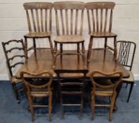 A MAHOGANY WIND OUT DINING TABLE, with a single leaf, raised on cabriole legs with castors, extended