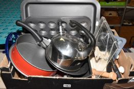 A BOX OF COOK WARES, to include a cast iron Victor cookery book stand, a Swiss Kuhn Rikon stove