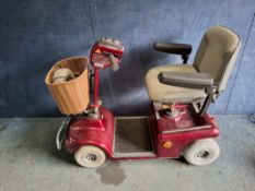 A SHOPRIDER MOBILITY SCOOTER (spares or repairs) with one key and charger, Condition Report: no