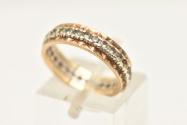 A 9CT GOLD BI-COLOUR FULL SET ETERNITY BAND RING, set with colourless spinel, hallmarked 9ct