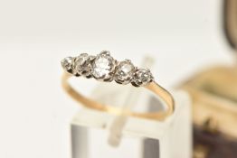 A DIAMOND FIVE STONE RING, set with graduating old cut diamonds, claw set, to the plain polished