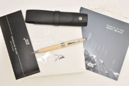 A 'MONT BLANC' BALLPOINT PEN AND POUCH, a 'meisterstuck' cream ballpoint pen, together with pouch,
