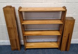 A PINE BOOKCASE, comprising five uprights and twelve shelves Dimensions:one section width 83cm x