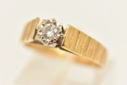 AN 18CT GOLD SINGLE STONE DIAMOND RING, illusion set round brilliant cut diamond, estimated