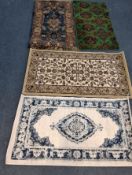 FOUR SMALL RECTANGULAR WOOLLEN RUGS, with varying colours, patterns, styles, etc Dimensions:white