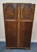 AN EARLY 20TH CENTURY OAK DOUBLE DOOR WARDROBE Dimensions:width 104cm x depth 53cm x height 183cm