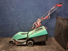 A BOSCH ROTAK 32R ELECTRIC LAWN MOWER with grass box (PAT pass and working)